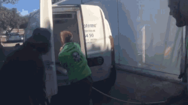 a white van that says materno on the side