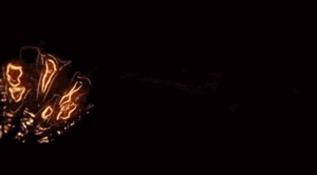 a computer generated image of a fire explosion in the dark