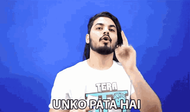 a man wearing a white t-shirt that says tera on it