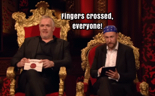 two men are sitting on a throne and one of them is wearing a bandana that says fingers crossed everyone