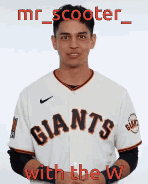 a man wearing a giants jersey says mr scooter with the w.