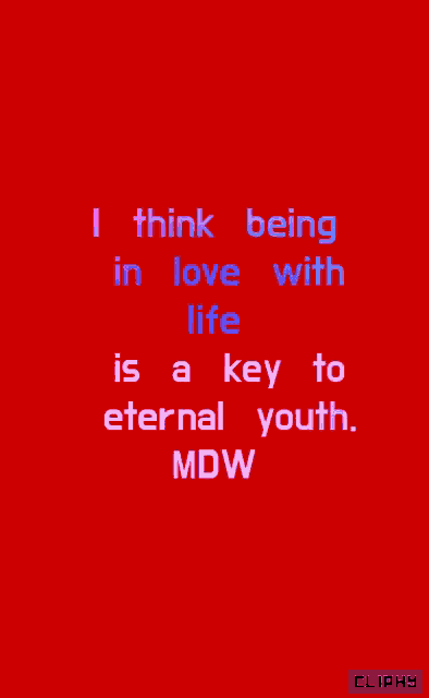 a red background with blue text that says i think being in love with life is a key to eternal youth