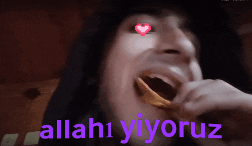 a man with a heart in his eye is eating chips and the words allah1 yiyoruz are behind him