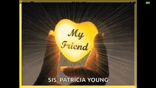a person holding a heart that says " my friend "