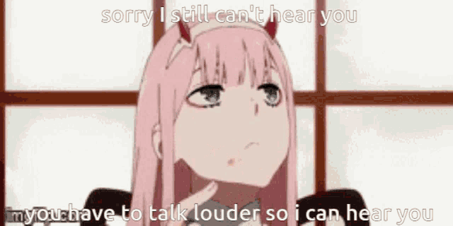 a pink haired anime girl with horns is talking to someone and says `` sorry i still can 't hear you '' .