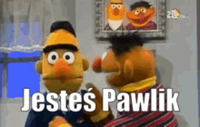 ernie and bert from sesame street are standing next to each other and talking .