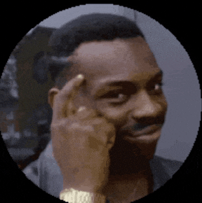 a man with his finger on his forehead is wearing a watch