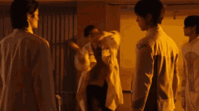 a man in a lab coat is practicing how i 'll break the culprit 's neck