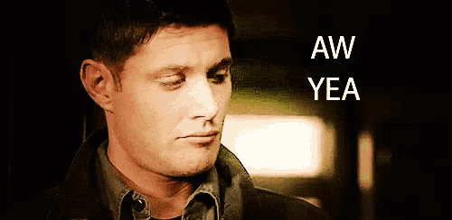 a close up of a man 's face with the words aw yea above it