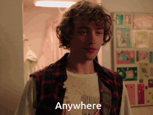 a man in a plaid shirt says anywhere