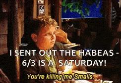 a boy is sitting at a table with a candle and says i sent out the habeas 6/3 is a saturday .