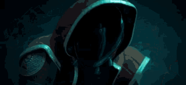 a close up of a robot 's face with glowing eyes .