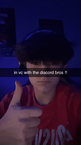 a boy wearing headphones giving a thumbs up with the words in vc with the discord bros