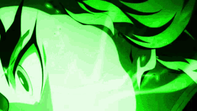 a close up of a person 's face with a green light behind them .