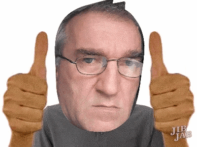 a man wearing glasses is giving a thumbs up sign