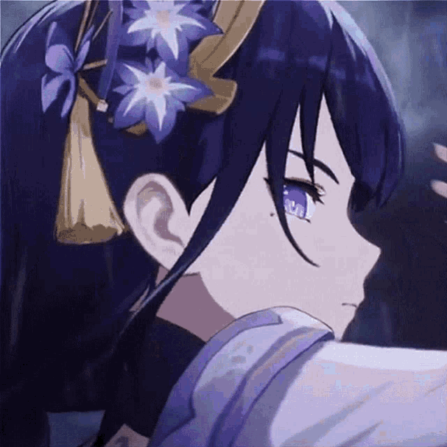 a close up of a girl with purple flowers in her hair
