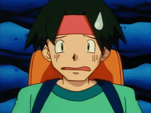 a close up of a cartoon character 's face with a tear on his forehead