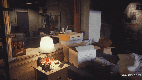 a lamp sits on a table in a dark room with boxes and a sign that says illustrate soul