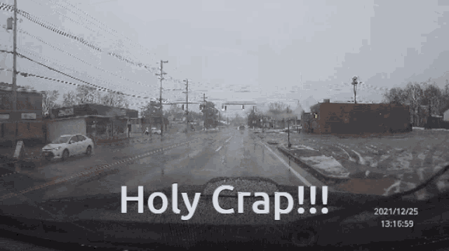 a screenshot of a car windshield with the words holy crap !!!