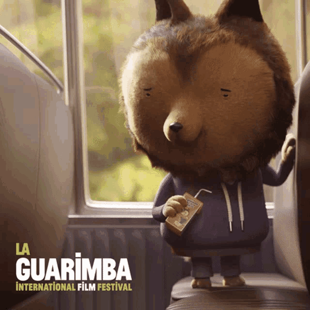 a poster for la guarimba international film festival features a cartoon character