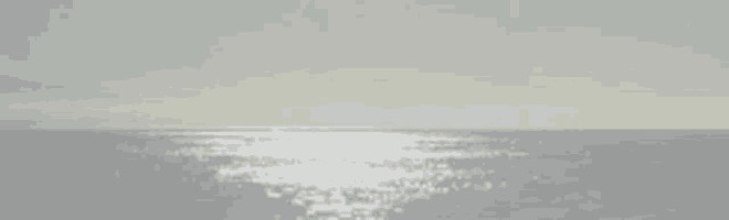 the sun is reflected in the water of the ocean
