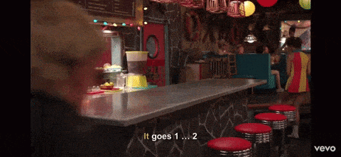 a video of a diner with the words " it goes 1 ... 2 "