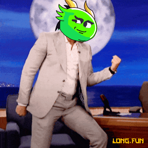 a man in a suit is dancing with a green face on his head that says long fun on the bottom