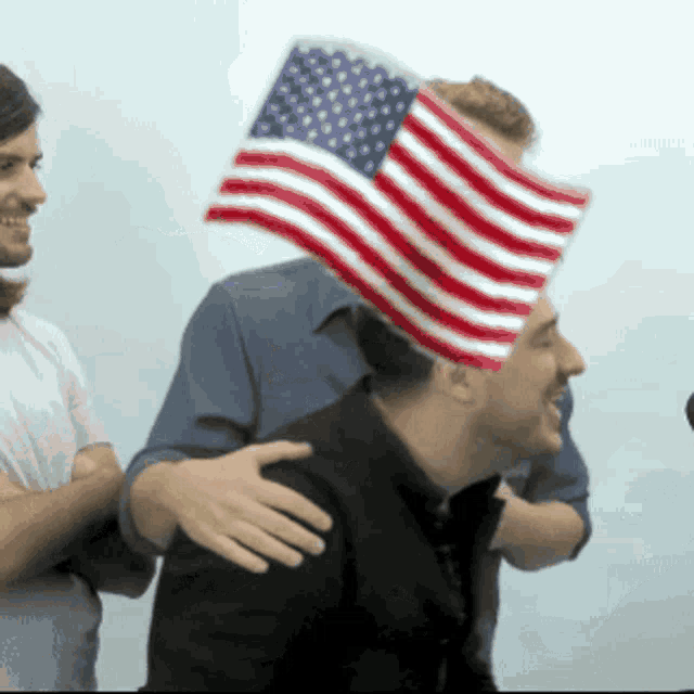 a man with an american flag on top of his head