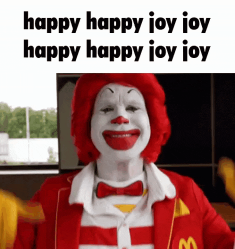 mcdonald 's ronald mcdonald is wearing a red and white striped suit and bow tie and making a funny face .