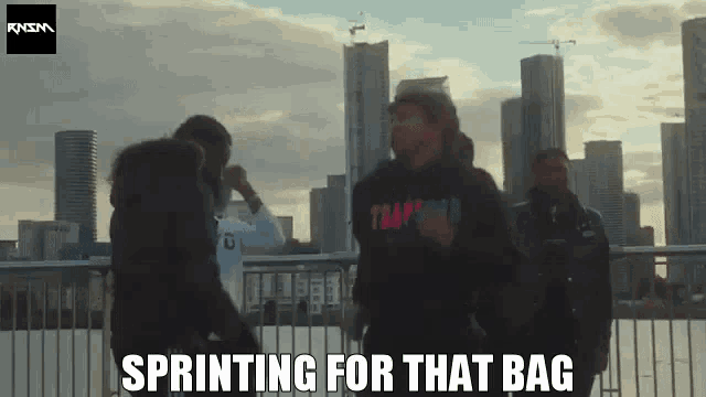a group of people are standing in front of a city skyline with the words " sprinting for that bag " on the bottom