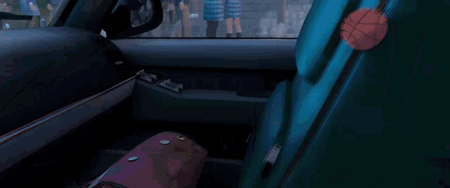 a man in a suit and tie is sitting in a car