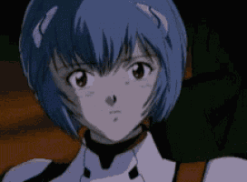 a close up of a cartoon character with blue hair