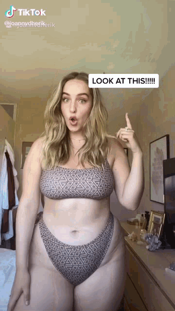 a woman in a bikini says look at this in a tiktok video