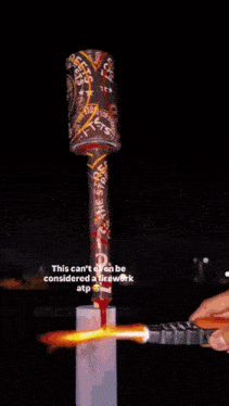 a picture of a fireworks display with the caption " this can never be considered a work at "