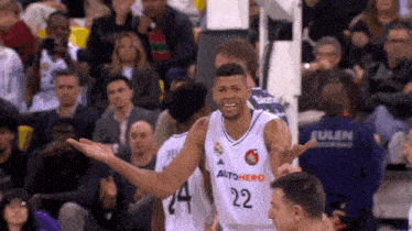 a basketball player wearing a jersey with the number 22 on it