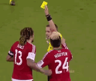 a man in a red jersey with the number 24 on it