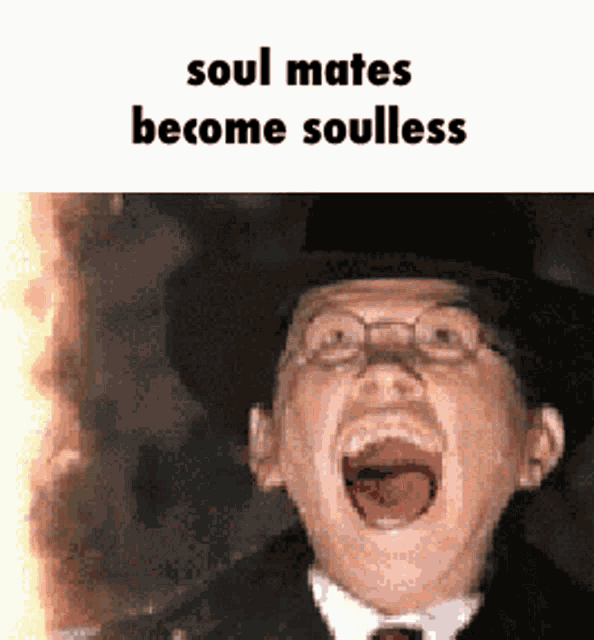 a man in a top hat is screaming with the words soul mates become soulless above him