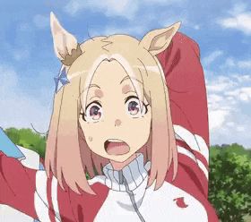 a girl with a crown on her head is wearing a red and white jacket with a bird on it .