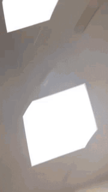 a blurry picture of a person standing in a room