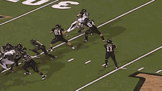 a football game is being played on a field sponsored by bb & t field