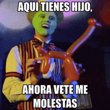 a man with a green mask is holding balloons and says aqui tienes hijo