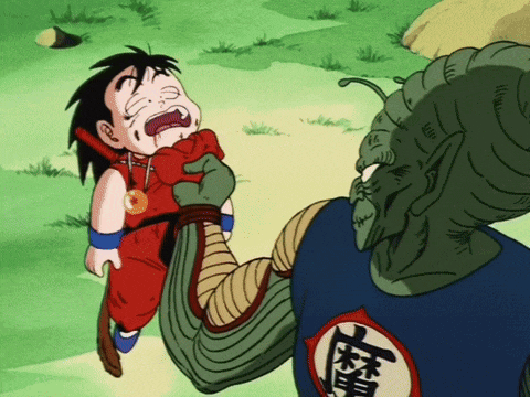 a cartoon character with chinese writing on his shirt is holding a child