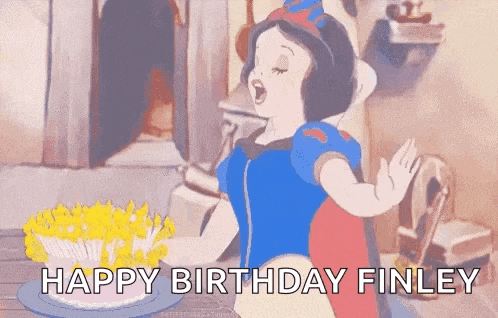 snow white from snow white and the seven dwarfs is singing happy birthday finley while holding a birthday cake .