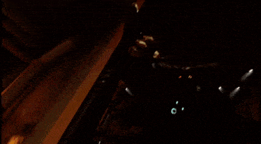 a blurry picture of a person walking in the dark