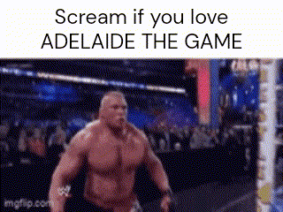 a man without a shirt is screaming in a boxing ring .