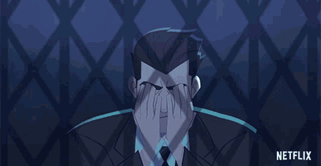a man in a suit and tie is covering his mouth with his hands and a netflix logo is visible in the corner