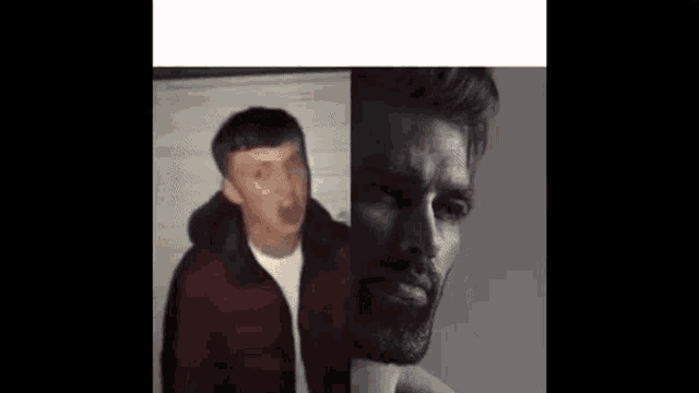 a man in a red jacket and a man with a beard are standing next to each other in a black and white photo .