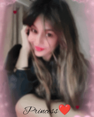 a blurry picture of a woman with the word princess written below her