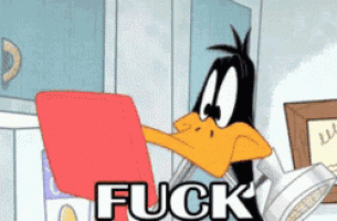 a cartoon of daffy duck sitting at a desk with the word fuck written in the corner