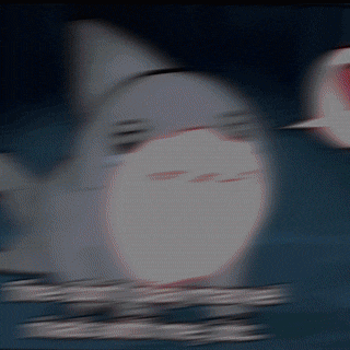 a blurry picture of a shark with its eyes closed and its mouth open